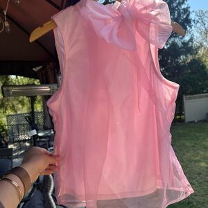 CeCe Pink Sleeveless  Blouse with a bown to the neck